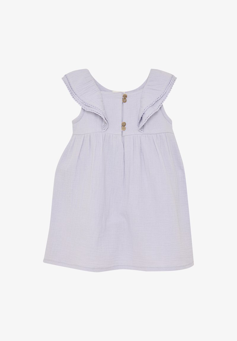 Vestito senza maniche di colore viola chiaro con scollo arricciato, tre bottoni di legno sul davanti e gonna drappeggiata. Tessuto morbido e strutturato.