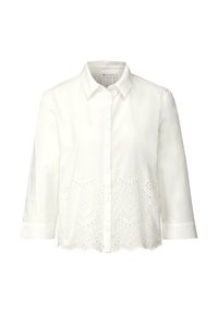 Camicia bianca con maniche a tre quarti, dotata di orlo scallop e dettagli ricamati a intaglio nella parte inferiore. Realizzata in tessuto leggero.