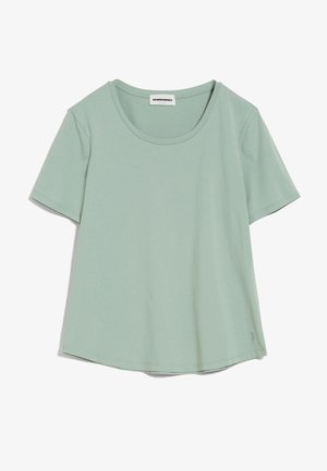 Jasnozielona, bawełniana koszulka z krótkim rękawem, okrągłym dekoltem i małym logo przy dolnym brzegu.