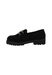 Mocassino in suede nero con suola in gomma spessa, caratterizzato da una fascia decorativa con due dettagli rotondi. Texture liscia con punta arrotondata.