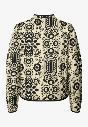 Giacca trapuntata con un motivo floreale e geometrico nero su uno sfondo beige. Bordo nero lungo il colletto e l'orlo.