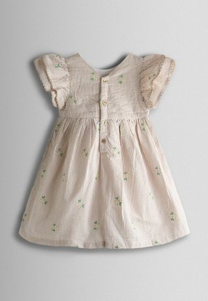 Triibuline hele beež puuvillast kleit lühikeste volangvarrukatega, ees olevate nööpide ja rohelise lillemustriga tikanditega.