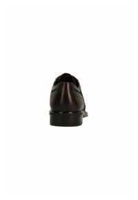 Bruine leren schoenen met een ronde neus, gedetailleerde stiksels en een lage hak. De achterkant heeft brogue-accenten.