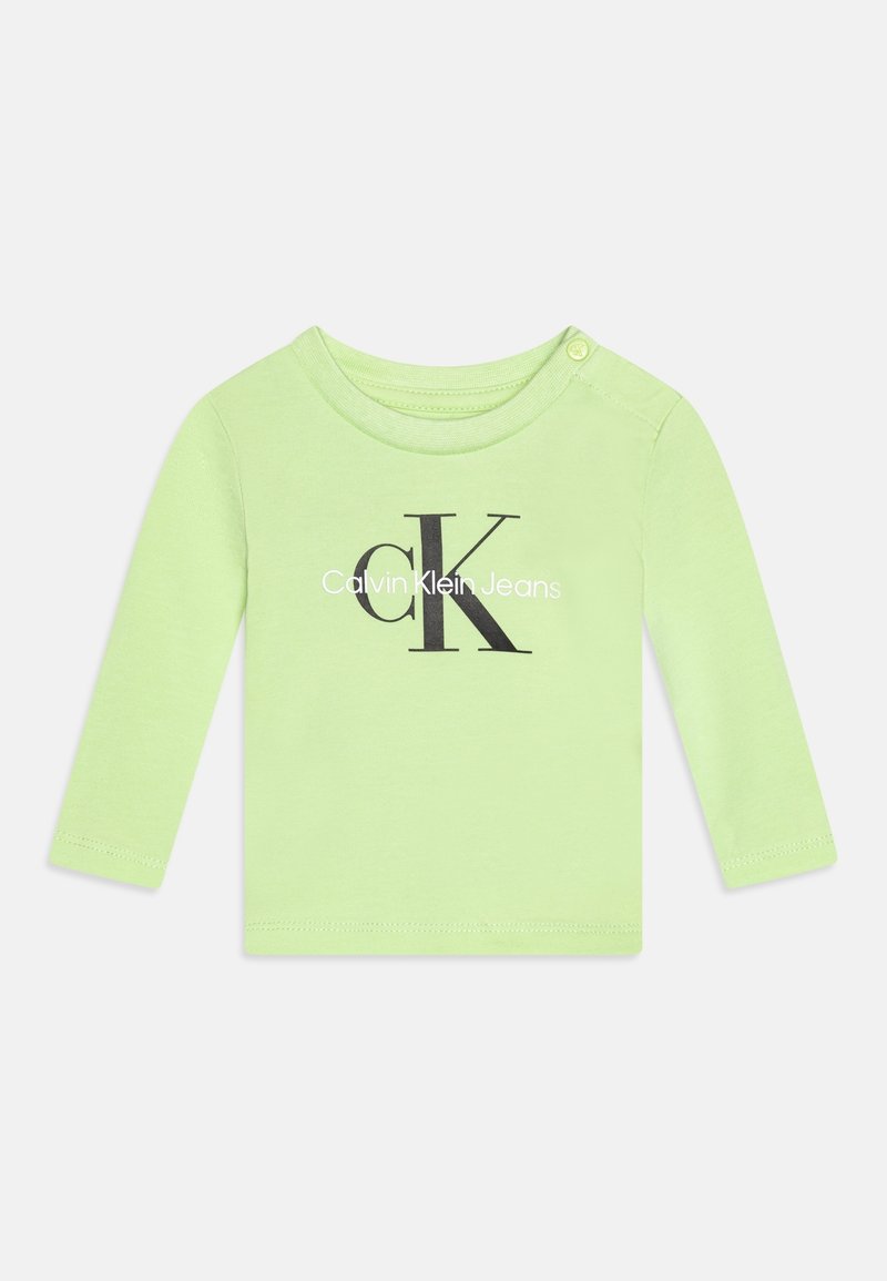 Jasnozielona, bawełniana koszula z długim rękawem, z okrągłym dekoltem, zapięciem na zatrzask na ramieniu oraz czarnym logo "Calvin Klein Jeans".