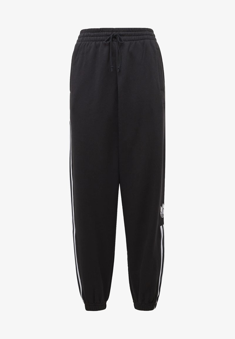 Pantalons de jogging noirs avec un waistband élastique, cordon de serrage, poches latérales et rayures blanches sur les côtés. Tissu doux avec des poignets côtelés.