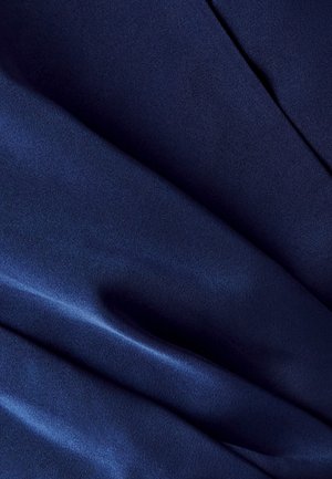 Navy blue satin fabric with a smooth texture, displaying subtle sheen and soft drapes; features slight folds and curves throughout.