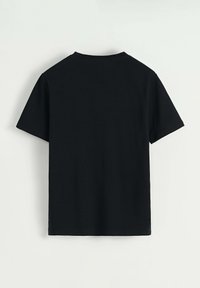 T-shirt en coton noir avec des manches courtes, col ras du cou et une texture lisse. La vue arrière montre un design simple sans graphiques ni accents.