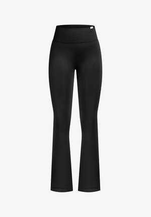 Czarne, rozszerzane legginsy z wysokim, prążkowanym paskiem. Wykonane z miękkiego, elastycznego materiału o gładkiej strukturze, bez widocznych wzorów czy akcentów.