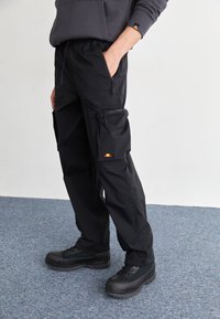 Ellesse - SQUADRON PANT - Cargo trousers - black Thumbnail Image 1