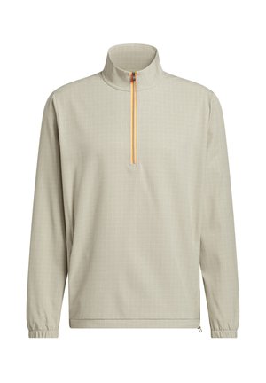 Beige pullover met kwartritssluiting en subtiel ruitpatroon, hoge kraag, oranje ritssluiting, lange mouwen met elastische boorden en verstelbare zoom.