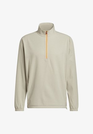 Beige pullover met kwartritssluiting en subtiel ruitpatroon, hoge kraag, oranje ritssluiting, lange mouwen met elastische boorden en verstelbare zoom.