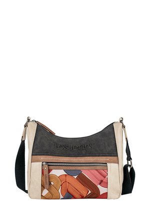 Bolso hobo en materiales crema, marrón y negro que presenta un bolsillo con cremallera con patrones abstractos coloridos y una correa negra ajustable.
