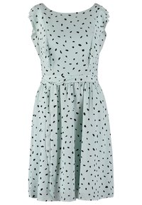 Robe vert menthe avec un motif à pois noir, manches courtes évasées, décolleté rond, taille cintrée et jupe évasée. Fabriquée en tissu léger.