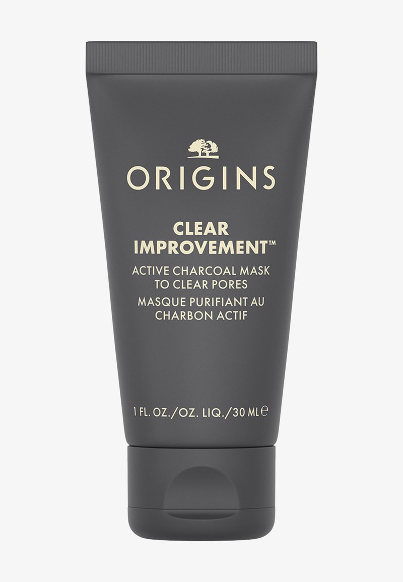 Grijze tube van Origins Clear Improvement actieve houtskoolmasker, met gouden tekst en een afgeronde flip-top dop, 30 ml formaat.