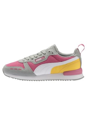 Gray, pink, white, and yellow Puma sneaker with mesh and suede textures, laces, and a white sole with a pink heel accent.