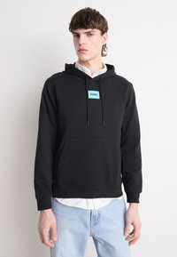 HUGO DARATSCHI - Hoodie - black