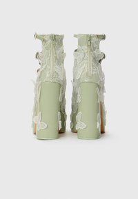 Koi Footwear WILD LOTUS - Plateaupumps - green