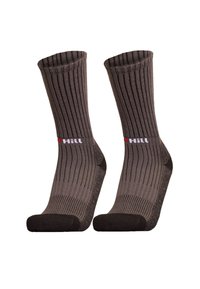 Gray crew socks with a ribbed design, reinforced heel and toe, and red and white logo band near the cuff. Made from soft, durable material.