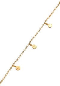 Bracelet en chaînette dorée avec trois petits accents circulaires plats. Les maillons sont délicats et espacés de manière uniforme, ce qui contribue à un design minimaliste.