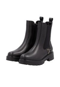Black leather ankle boots with elastic side panels, textured black and grey animal print accent, and chunky rubber soles.
