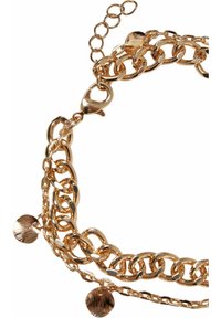 Bracciale in metallo dorato con charm rotondi e testurizzati; presenta anelli intrecciati e una chiusura a gancio per una lunghezza regolabile.