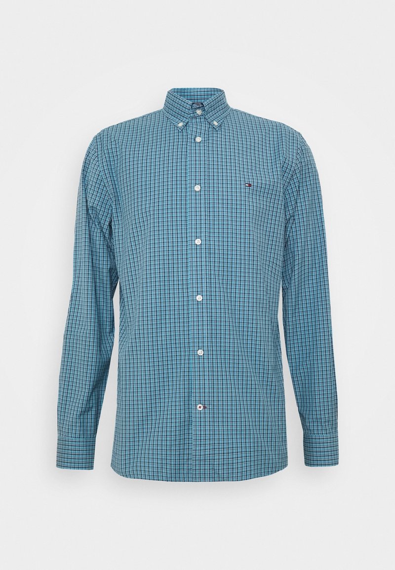 Camicia blu a maniche lunghe con motivo a quadri bianco e nero e piccolo logo sul petto sinistro.