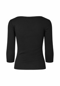 Chemise noire cintrée à manches longues avec un col bateau vue de dos sur fond blanc.
