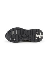 Schwarze Gummisohle mit strukturiertem Griffmuster, die ein geschwungenes Design aufweist und das Logo "PREMIATA" in der Mitte geprägt ist.