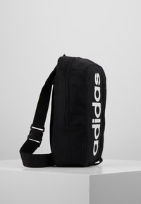 adidas Performance ESSENTIALS LINEAR SPORT CROSS BODY BAG - Umhängetasche - black/white