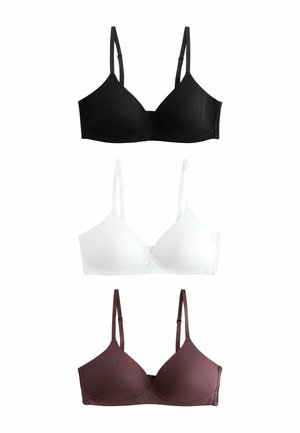 Tri bezdrôtové podprsenky s nastaviteľnými ramienkami v čiernej, bielej a tmavo hnedej farbe, zobrazené na bielom pozadí.