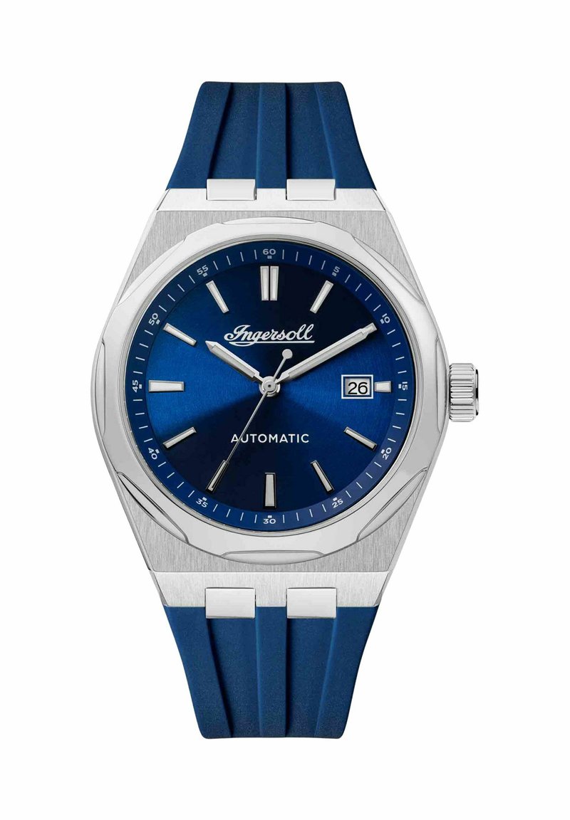 Zegarek automatyczny Ingersoll z ciemnoniebieską tarczą, srebrną stalową kopertą i niebieskim gumowym paskiem. Posiada okno daty oraz srebrne indeksy godzinowe.