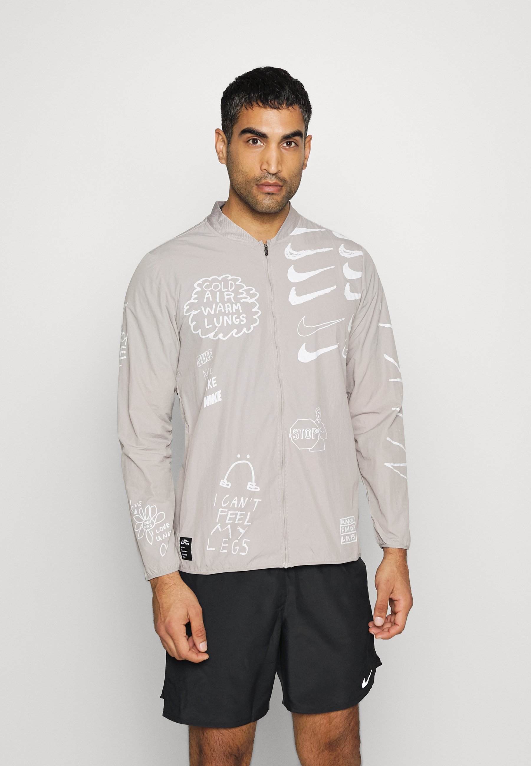 Nike Performance RUN - Chaqueta de running - college grey/silver/gris -  Zalando.es