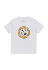 Biała koszulka z krótkim rękawem z okrągłym, żółtym logo z czarnymi palmami oraz napisem "BILLABONG SINCE 1973" w pogrubionej czcionce.