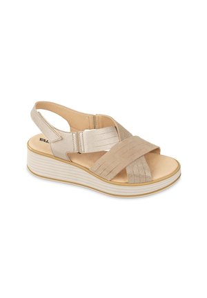 Sandali con zeppa beige, dotati di cinturini incrociati, materiale testurizzato, cinturino posteriore elasticizzato, soletta imbottita e suola rigata. Finitura liscia e dettagli in colori chiari.