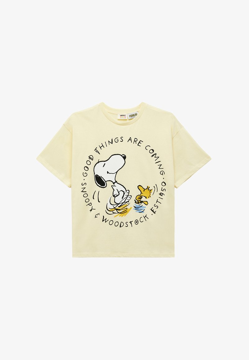Cream-colored T-shirt with Snoopy and Woodstock dancing, surrounded by the text "Good things are coming" and "Snoopy & Woodstock Est. 1950".