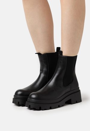 Bottines à plateau - black