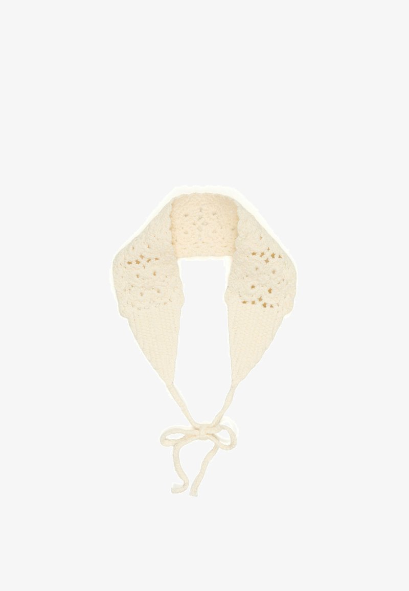Cream-colored crochet lace collar with floral patterns and ties at the front for fastening.