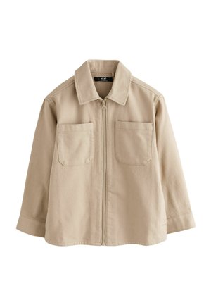 Beige Jacke aus weichem Stoff, mit Reißverschluss vorne, zwei Brusttaschen und spitzem Kragen sowie langen Ärmeln.