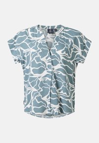 Blouse à manches courtes avec motif floral abstrait bleu et blanc et col en V sur fond uni.