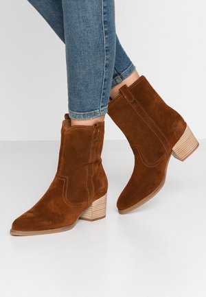 Botines camperos - cognac