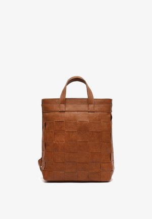 Brown leather backpack with woven pattern and dual top handles shown against a white background.