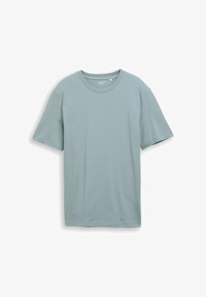 Világoskék, rövid ujjú, kerek nyakú, laza szabású póló, fehér háttér előtt, síkban kihelyezve.