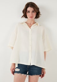 Bluza z gumbi - ecru