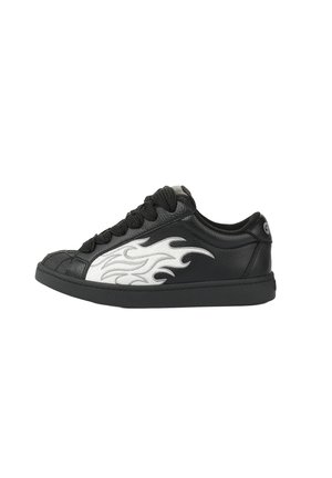 Black low-top sneaker with thick black laces and white flame design on the side, textured toe cap, and logo on the heel collar.