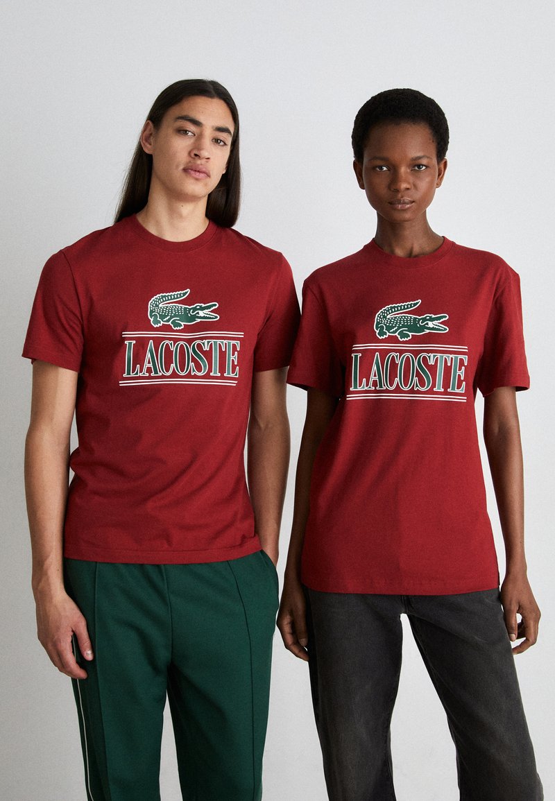 Lacoste - UNISEX - Nyomott mintás póló - ora, Nagyítás