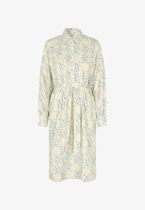 Shirtjurk van lichtgele stof met blauwe bloemprint, met knoopsluiting aan de voorkant, klassieke kraag, lange mouwen en een strikceintuur.