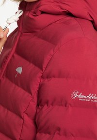 Schmuddelwedda Chaqueta de invierno - red