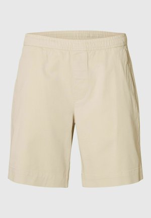 Bež kratke hlače do kolen z elastičnim pasom in stranskimi žepi, izdelane iz lahkega materiala, primerne za vsakodnevno nošenje.
