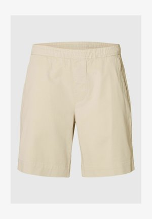 Bež kratke hlače do kolen z elastičnim pasom in stranskimi žepi, izdelane iz lahkega materiala, primerne za vsakodnevno nošenje.