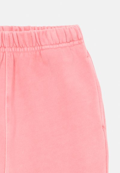 Rosa Sweatpants mit elastischem Bund, sichtbarem Seitentasche und weichem, strukturiertem Stoff.